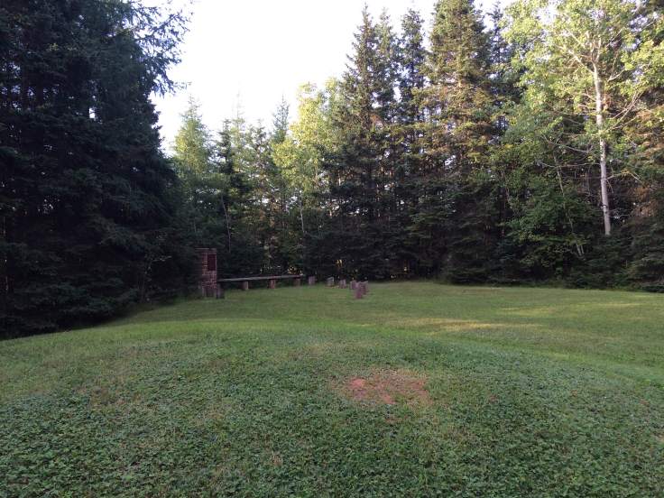 Clearing at the end of Monument Road, with the monument dedicated to Franklin Knight Lane in the background.